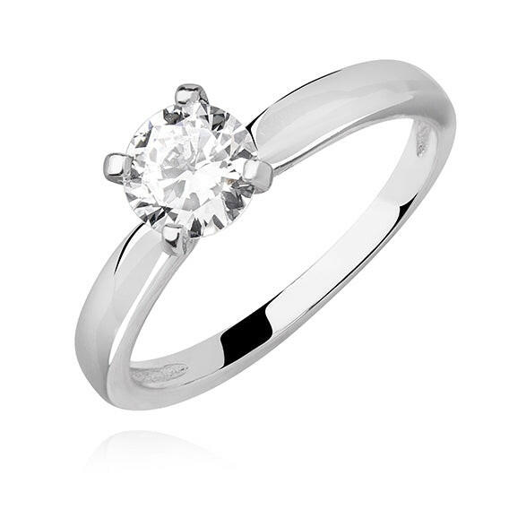 Silver ring with a clear gemstone on a white background
