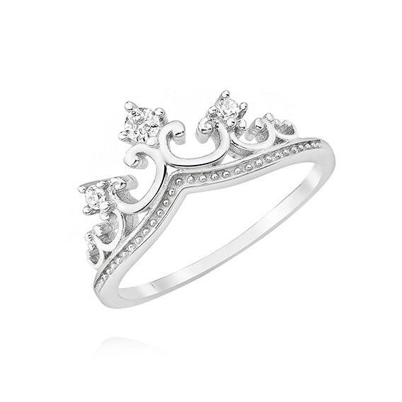 Silver tiara-shaped ring with small diamonds on a white background