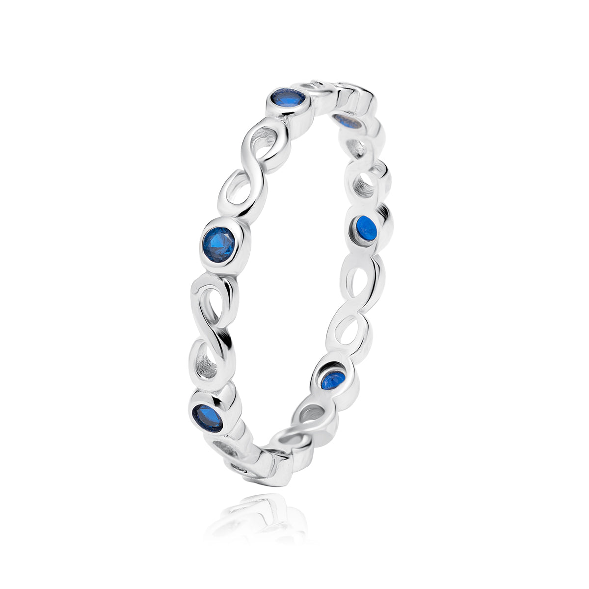 A silver ring with infinity loop designs and sapphire zirconia stones scattered along the band.