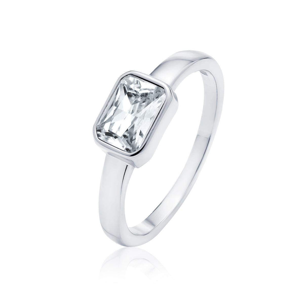 A silver ring with an emerald cut Zirconia stone set in the center, displayed against a white background.