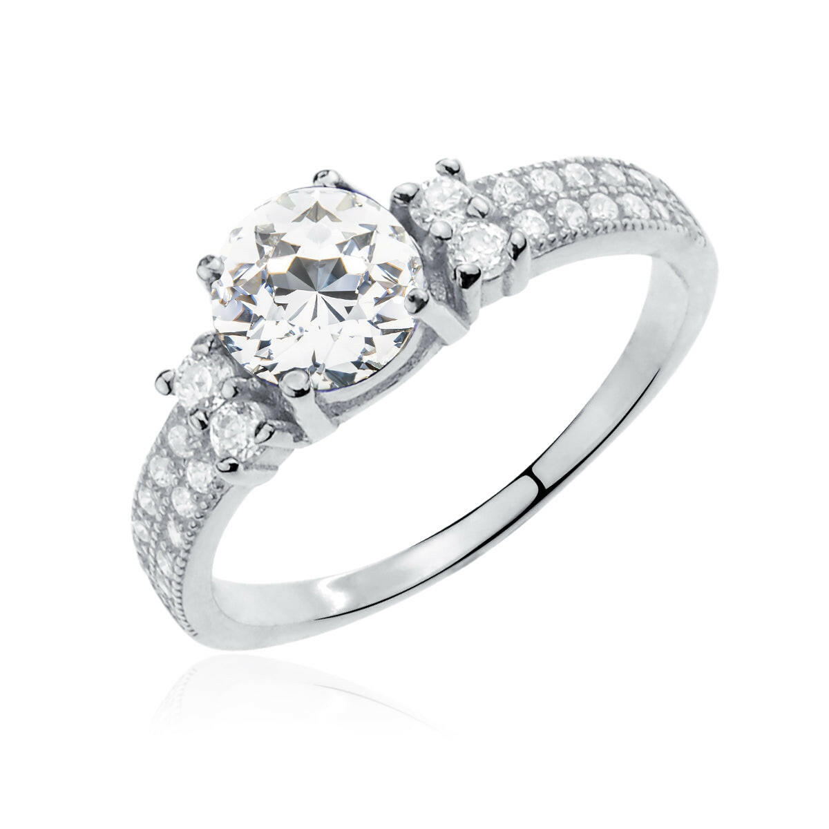 Silver ring with a large central diamond and smaller diamonds on the sides against a white background