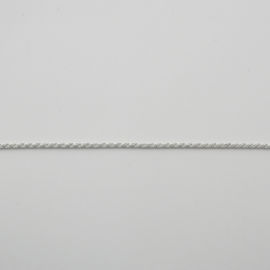 Silver chain on a light gray background