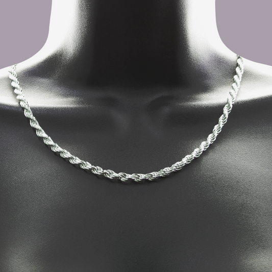 Silver rope chain necklace on a mannequin neck against a gray background