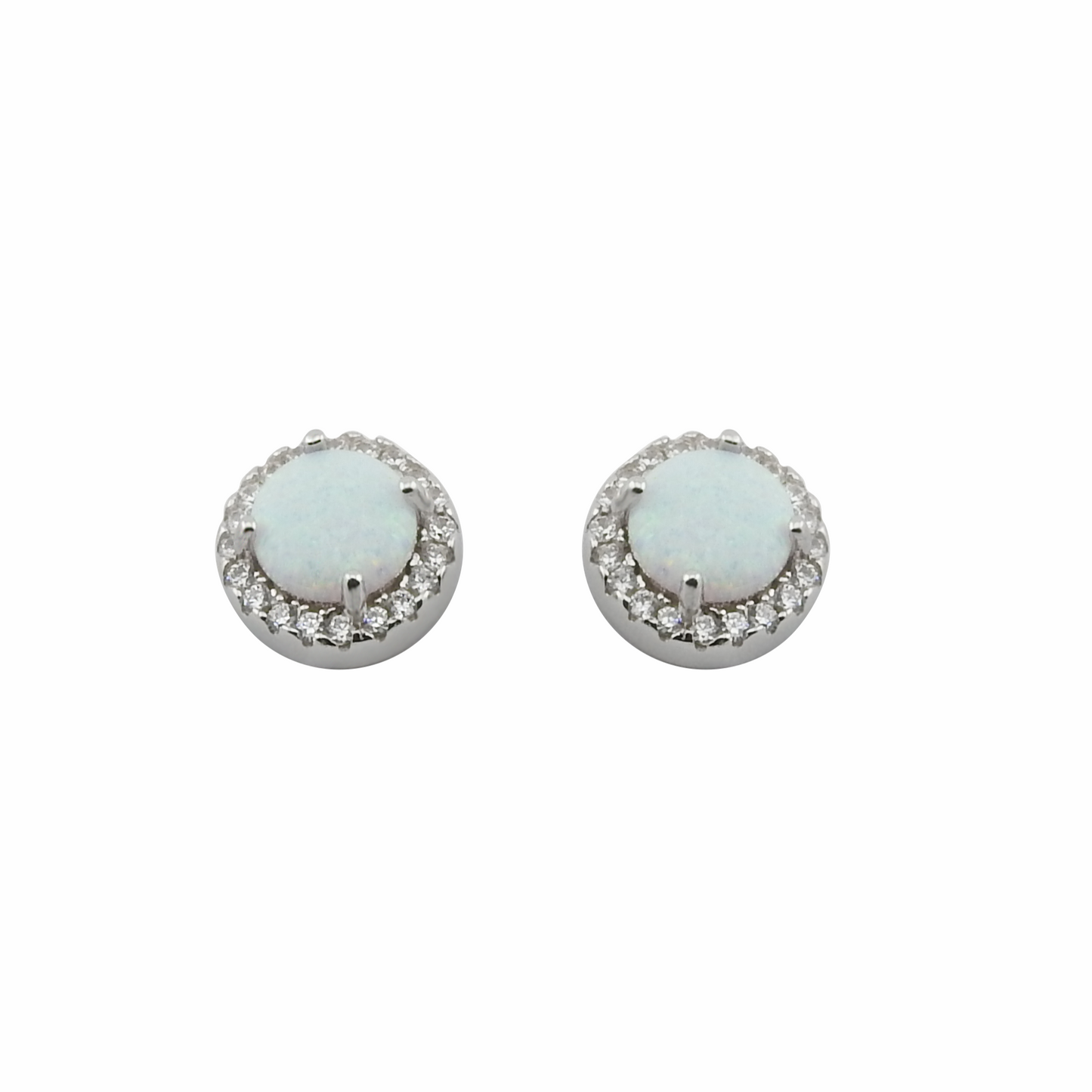 Pair of round earrings with white gemstones on a white background