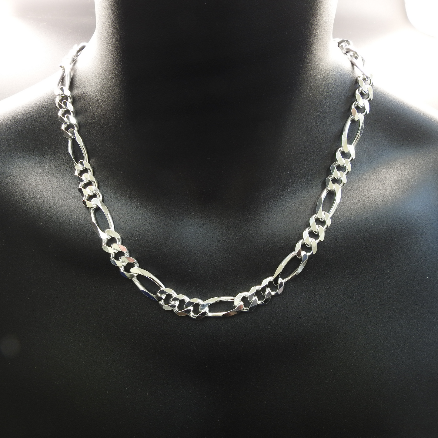 Silver chain necklace on a mannequin.