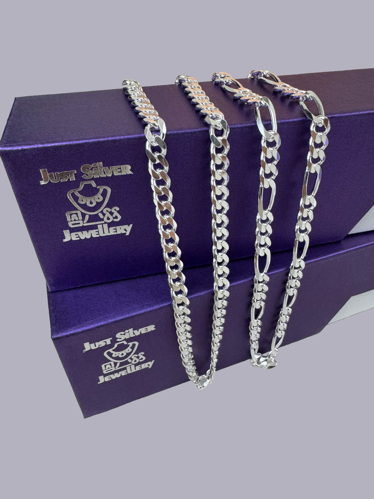 Silver chains on a purple Just Silver Jewellery box