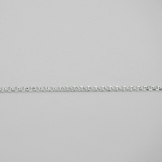 Silver chain on a light gray background