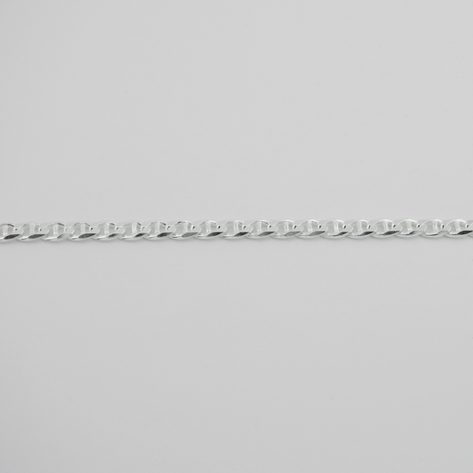 Silver chain on a light gray background