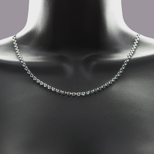 Silver chain necklace on a mannequin neck against a gray background
