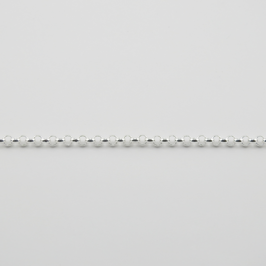 Silver beaded chain on a light gray background