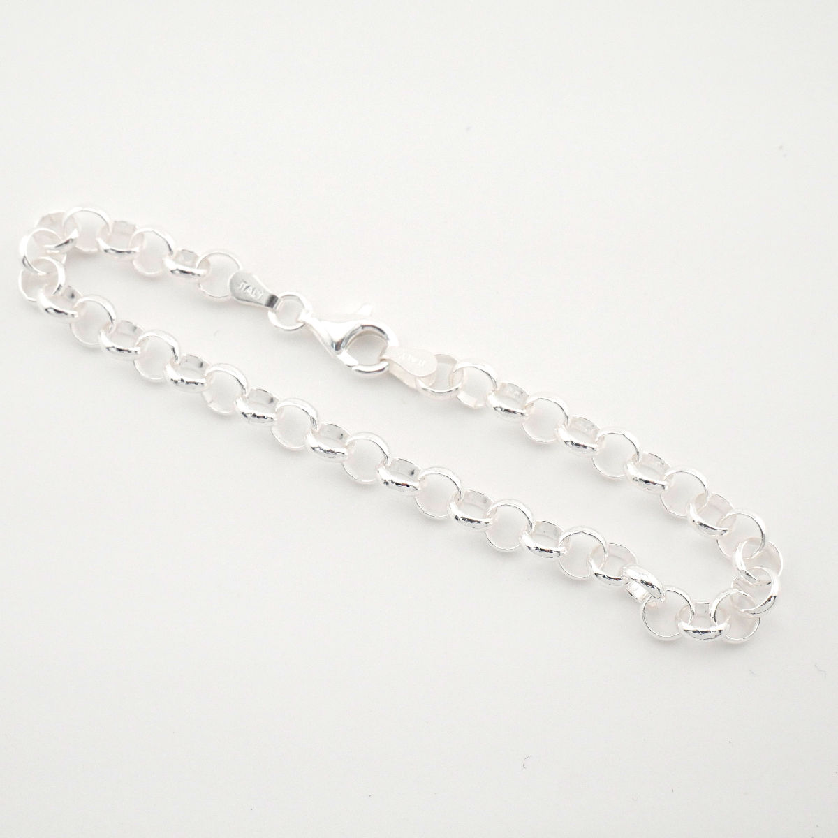 Silver chain necklace on a white background