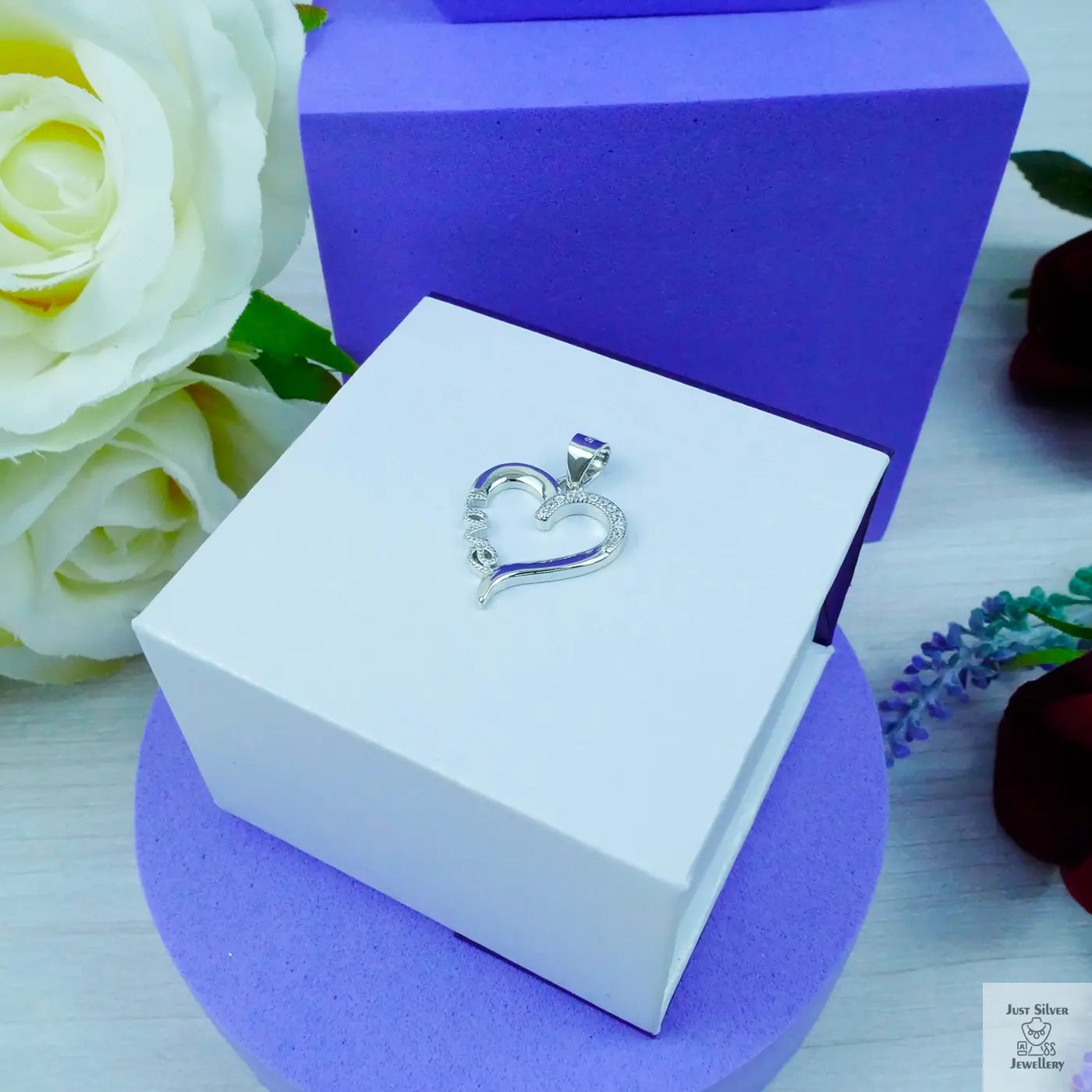 Silver "Love" heart shape pendant with white Zirconia gems Just Silver Jewellery