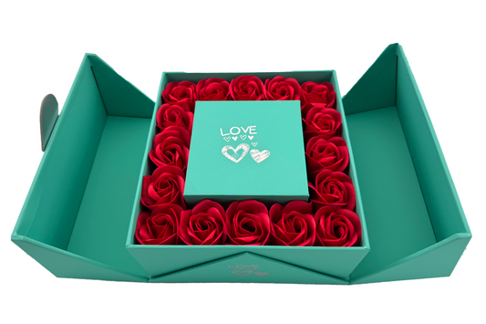 A red Eternity Double Door Rose Gift Box with a flip-top opening, containing a bed of red roses.