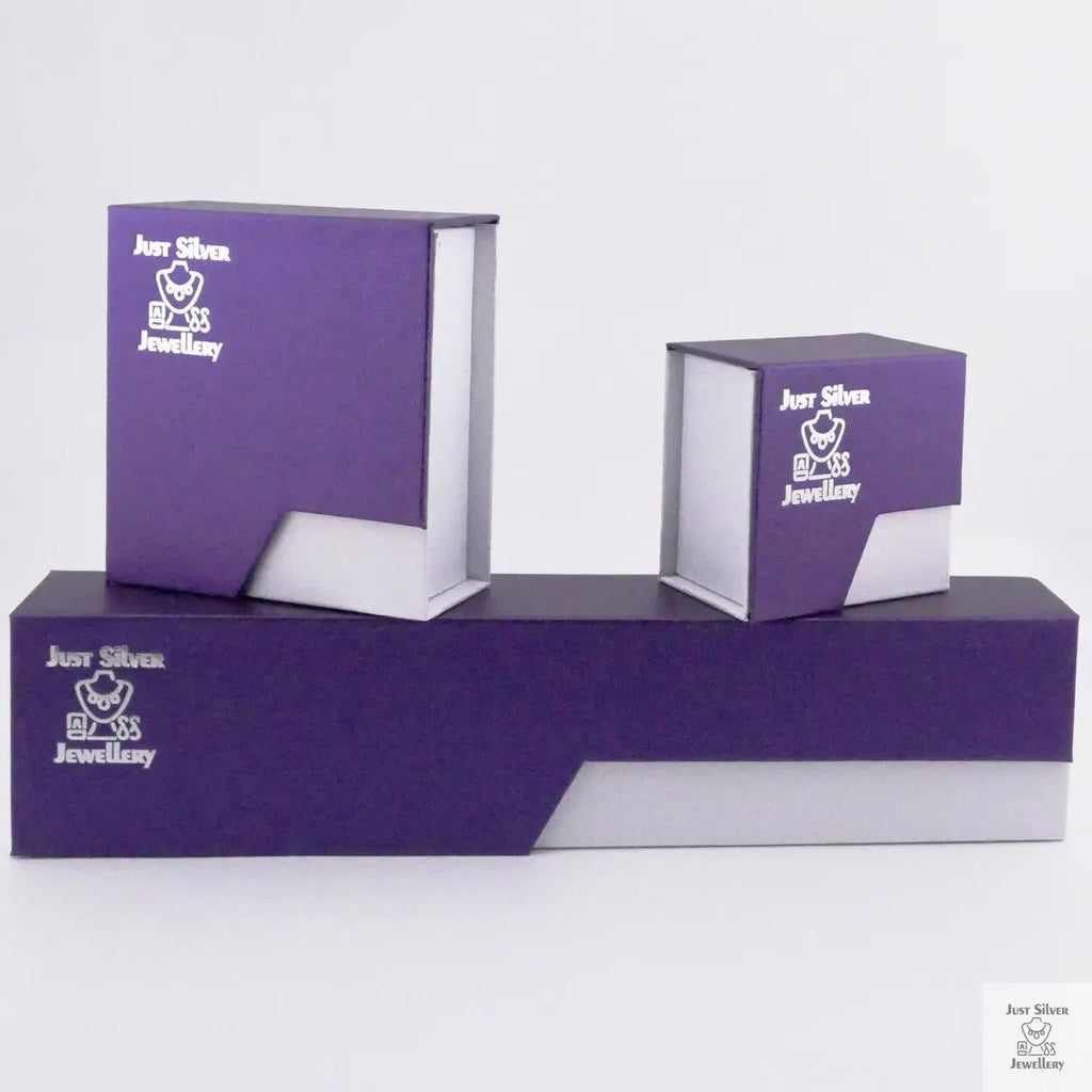 Set of purple jewelry boxes with a brand logo on a white background