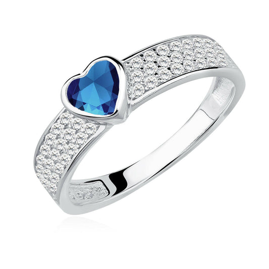 Silver ring with a blue heart-shaped gemstone on a white background