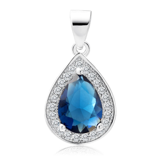 A silver teardrop-shaped pendant with a central blue sapphire gemstone surrounded by white zirconia