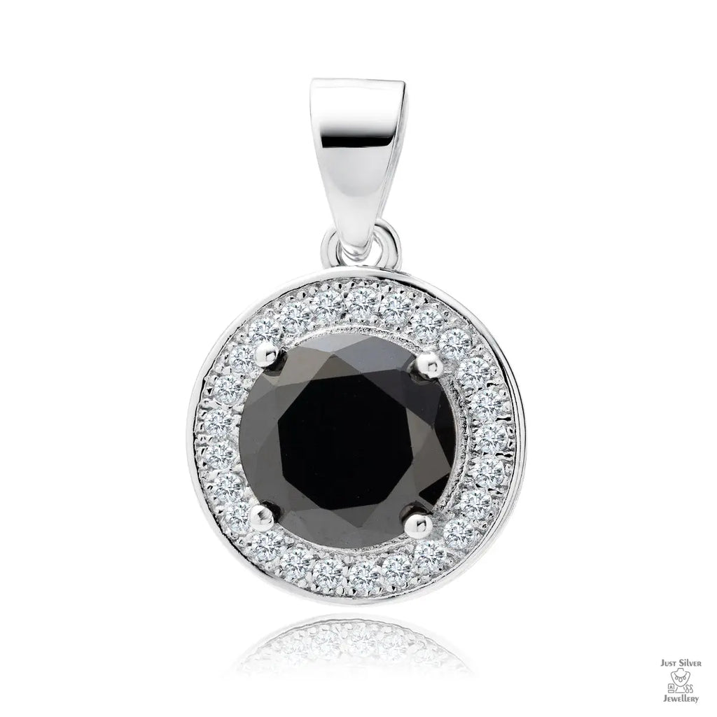 A round black zirconia gemstone pendant surrounded by white zirconia gemstones, set in silver.