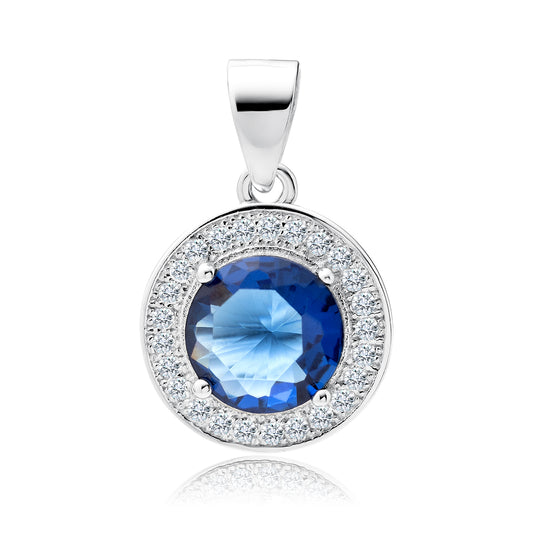 A round sapphire zirconia gemstone pendant with a cluster of white zirconia gemstones in a silver design.