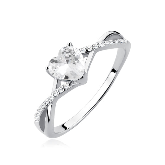 A sterling silver ring with a heart-shaped white zirconia centerpiece and sparkling zirconia cascading down the shank.