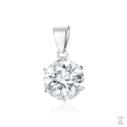 A silver pendant with a single round white zirconia in a clear setting
