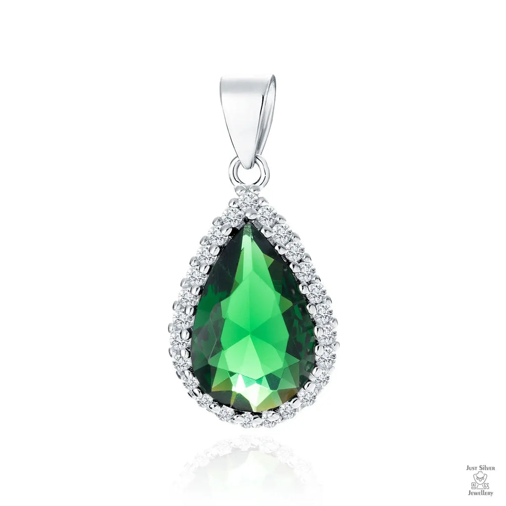 A silver pendant with a pear-shaped emerald zirconia centerpiece surrounded by white zirconia stones.