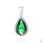 A silver pendant with a pear-shaped emerald zirconia centerpiece surrounded by white zirconia stones.