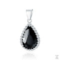 A silver pendant with a pear cut black zirconia in the center and white zirconia around it, suspended from a silver loop.