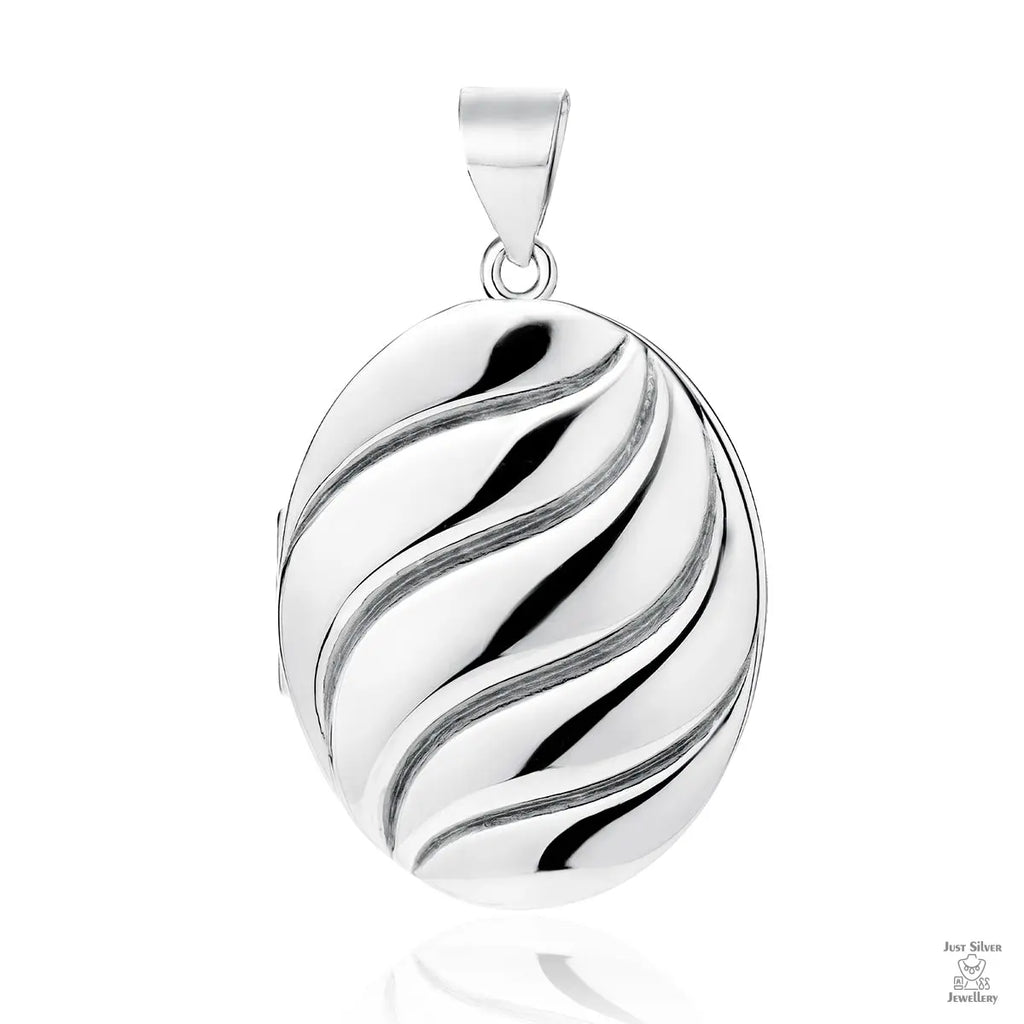 A silver locket with a swirl pattern, designed in an oval shape with a loop at the top for attachment.