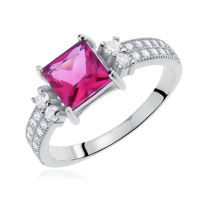 A silver ring with a square-cut ruby zirconia in the center and white zirconia accents along the bands.