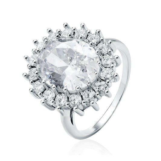Silver ring with a large central gemstone and smaller stones on a white background
