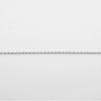 Silver chain on a light gray background