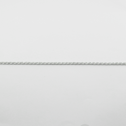 Silver chain on a light gray background