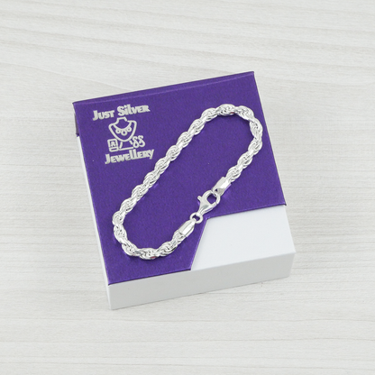 Silver bracelet on a purple card with 'Just Silver Jewellery' branding.