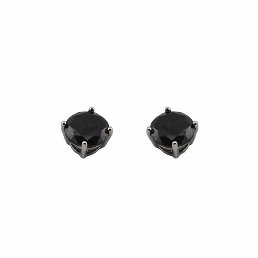 Pair of black stud earrings on a white background