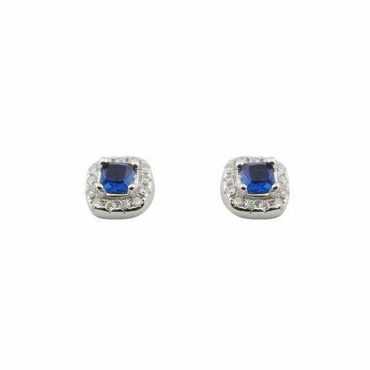 Pair of earrings with blue gemstones and clear stones on a white background