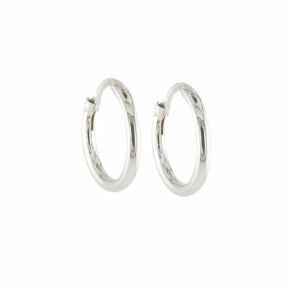 Silver hoop earrings on a white background