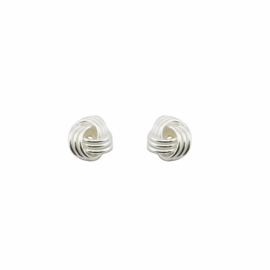 Pair of silver earrings on a white background