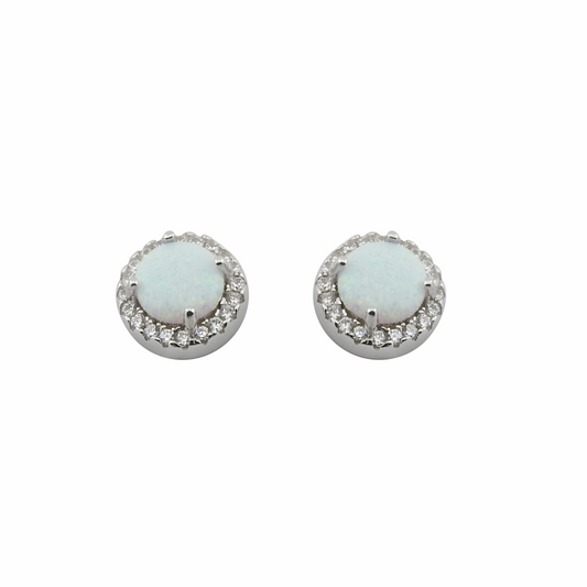 Pair of round earrings with white gemstones on a white background