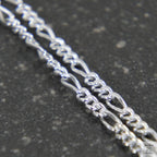 Close-up of a fine Figaro link