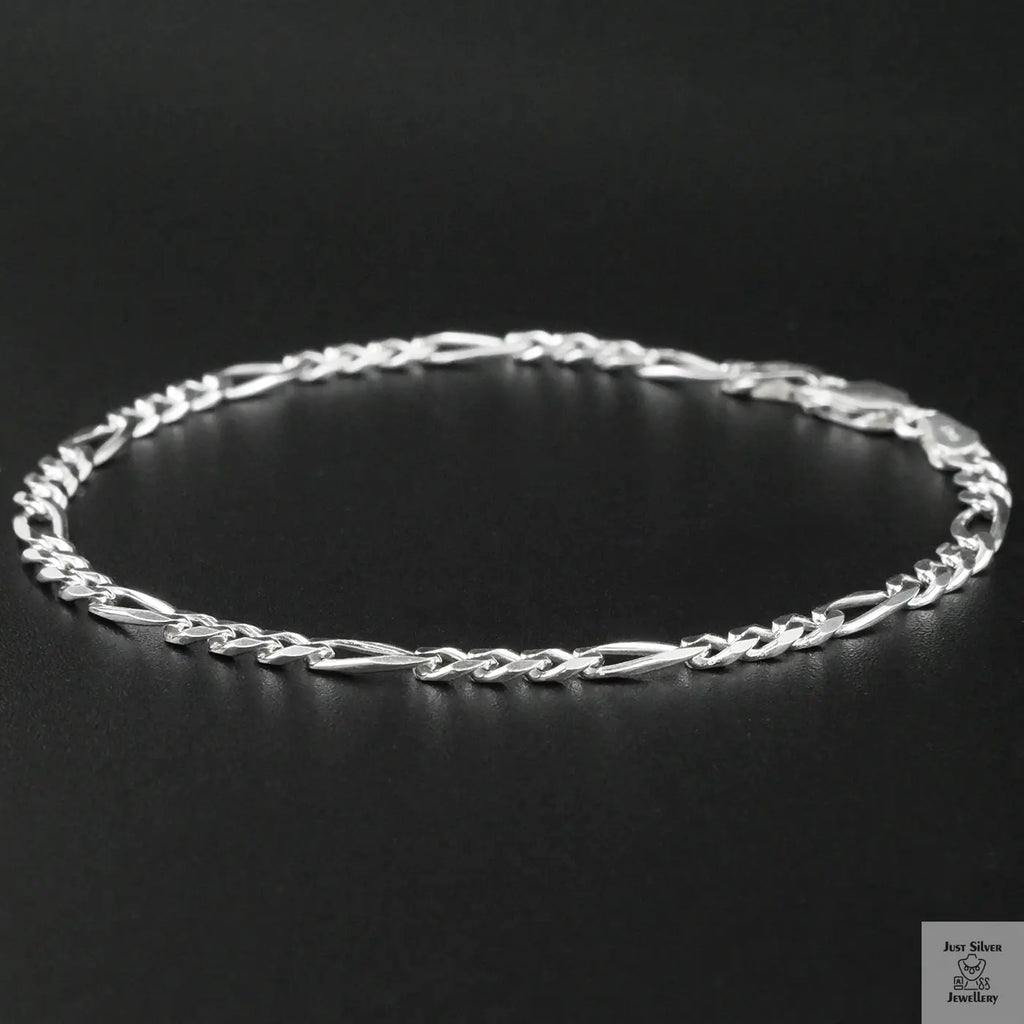 Silver bracelet on a black background