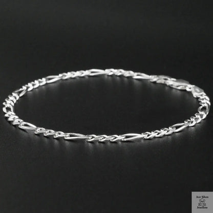 Silver bracelet on a black background