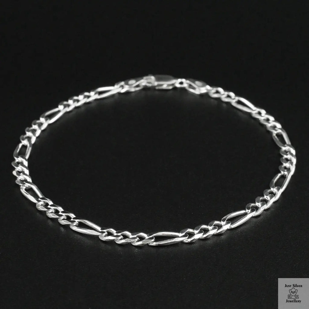 Silver bracelet on a black background