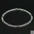 Silver bracelet on a black background