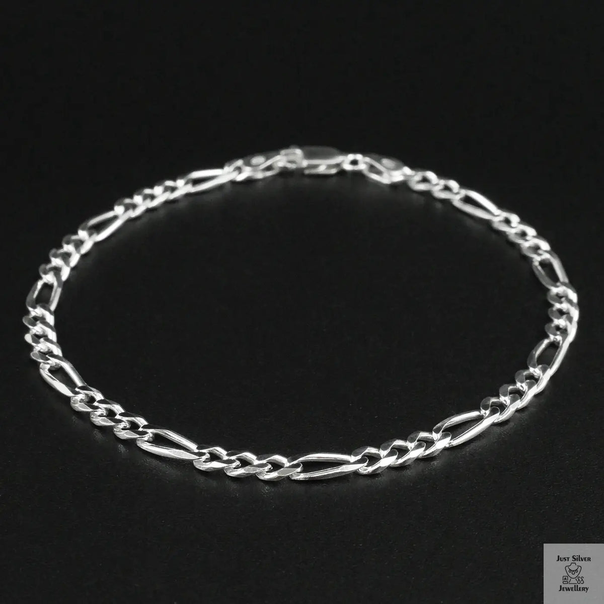 Silver bracelet on a black background