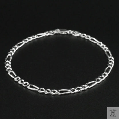 Silver bracelet on a black background