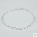 Silver bracelet on a light grey background