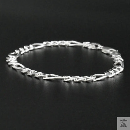 Silver bracelet on a black background