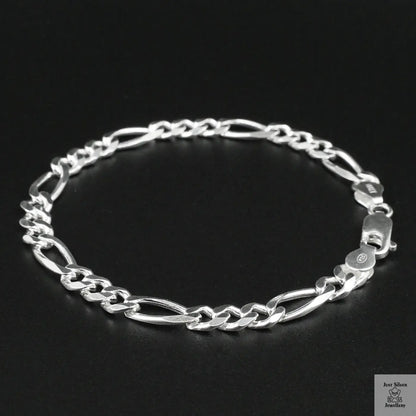 Silver bracelet on a black background