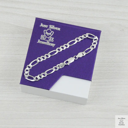 Silver bracelet on a purple card with 'Just Silver Jewellery' branding.