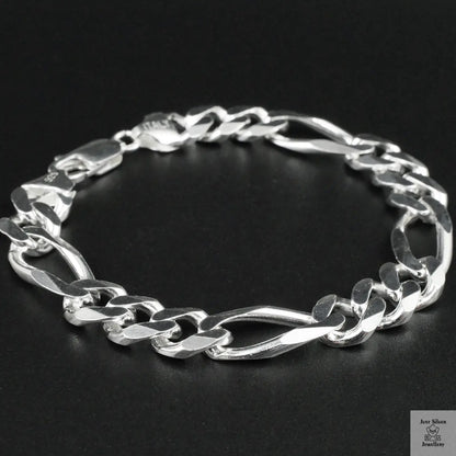 Silver bracelet on a black background